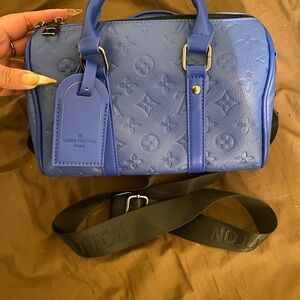 Louis Vuitton Vibrant Blue Embossed Satchel
